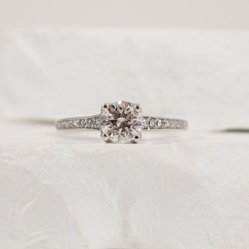 18KW Canadian Diamond 0.70 Carat Engagement Ring
18K White Gold & Palladium Canadian Natural Diamond Accented Engagement Ring
Center Diamond - 0.71 Carat Round Brilliant Cut Natural Canadian Diamond of SI2 Clarity, G Colour
Accent Diamon