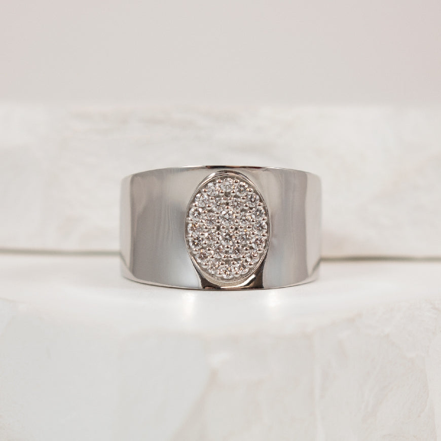 14KW 'Oval' Cluster Wide Diamond Ring             
14K White Gold Natural Diamond Ring
0.28 Total Natural Round Brilliant Cut Diamond Weight SI Clarity, G Colour
Finger Size 8.25