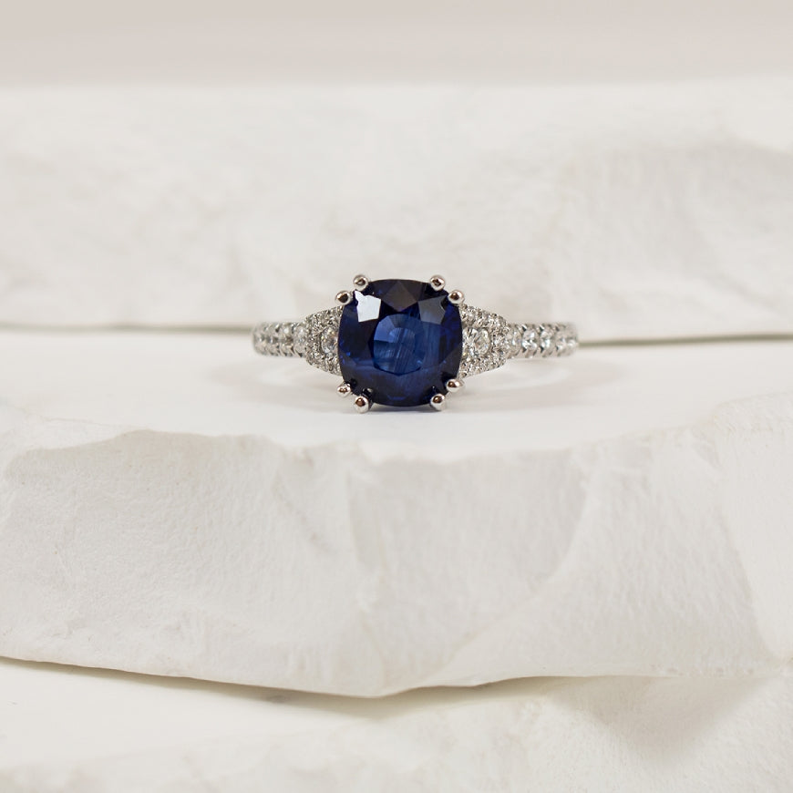 14KW S.Kashi Cushion Cut Sapphire & Diamond Ring
14K White Gold S.Kashi Sapphire & Natural Diamond Ring
1.91 Carat of Natural Cushion Cut Sapphire
0.32 Total Natural Diamond Weight SI Clarity, G Colour
Finger Size 6