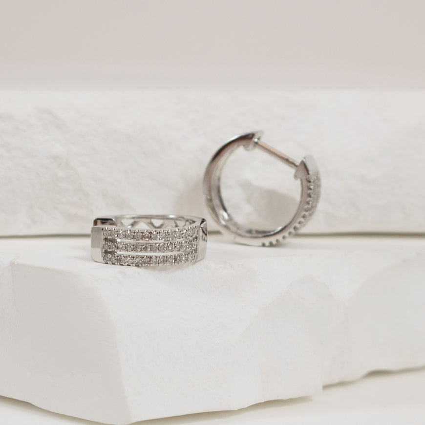 14KW Diamond Three Layer Huggie Hoop Earrings
14K White Gold Natural Diamond Huggie Hoop Earrings
0.25 Total Natural Diamond Weight SI Clarity, GH Colour
Earring Closure Huggie Hoop