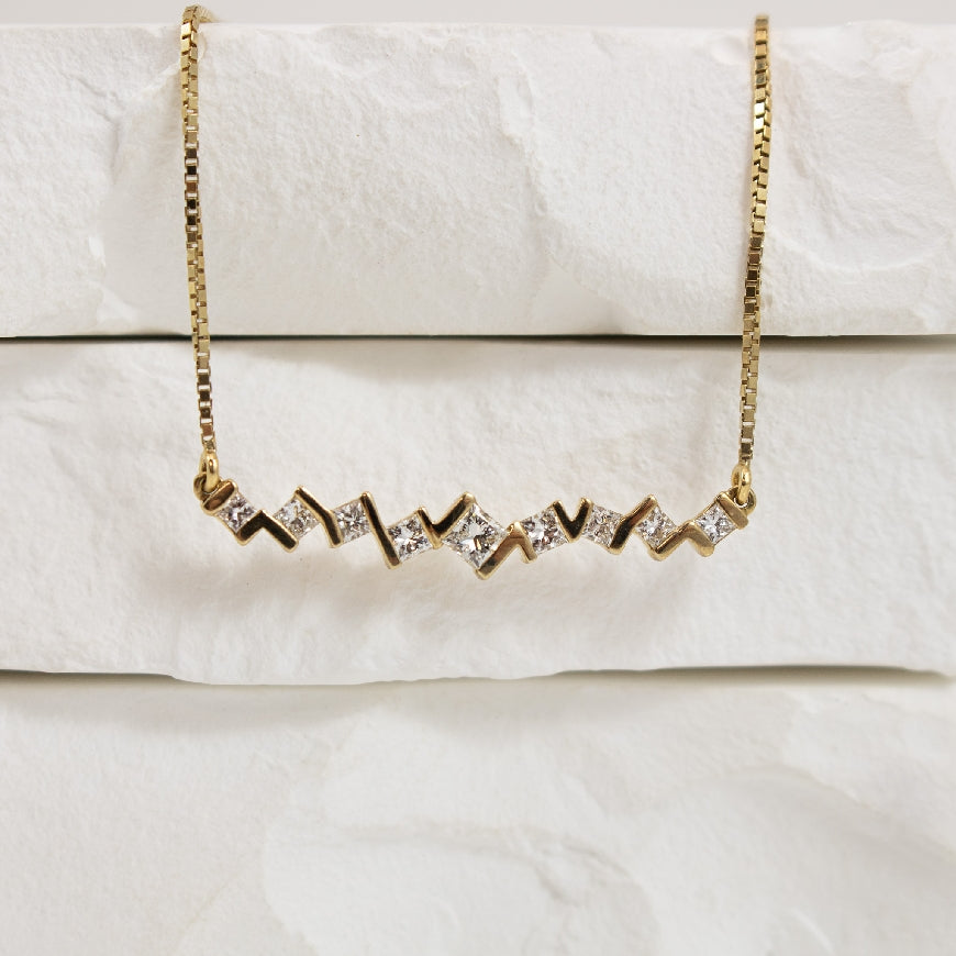 10KY Princess Cut Diamond Necklace
10K Yellow Gold Natural Canadian Diamond Necklace
0.324 Total Natural Diamond Weight of I1 Clarity, G Colour
Chain Length 18'
