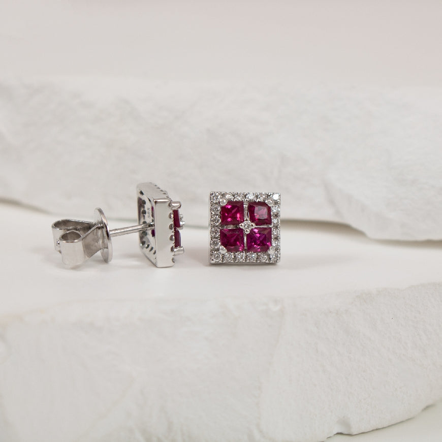 14KW Princess Cut Ruby & Diamond Halo Earrings
14K White Gold Ruby & Natural Diamond Earrings
0.98 Total Natural Ruby Weight
0.20 Total Natural Diamond Weight SI Clarity, G Colour
Earring Closure Post with Butterfly Back