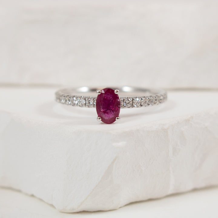 14KW Classic Oval Cut Ruby & Diamond Ring         
14K White Gold Oval Cut Ruby & Natural Diamond Ring
6x4mm Oval Cut Ruby
0.28 Total Natural Diamond Weight
Finger Size 7