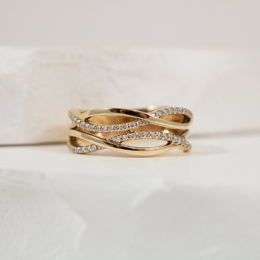 14KY Modern Look Diamond Twist Ring              
14K Yellow Gold Natural Diamond Twist Ring
0.20 Total Natural Diamond Weight
Finger Size 6.5