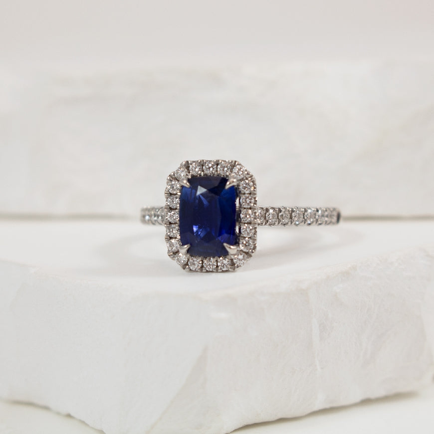 18KW Elongated Cushion Halo Sapphire &Diamond Ring
18K White Gold Sapphire & Natural Diamond Ring
1.29 Carat of Natural Elongated Cushion Cut Sapphire
0.36 Total Natural Diamond Weight SI Clarity, GH Colour
Finger Size 6.5
