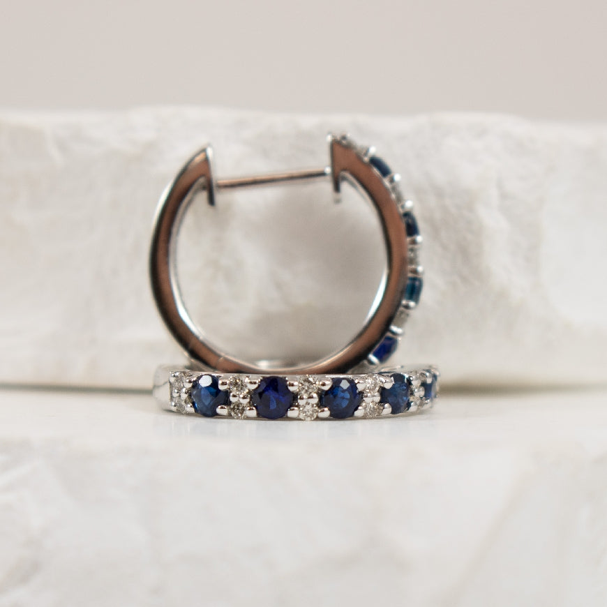 10KW Sapphire & Diamond Huggie Hoop Earrings
10K White Gold Sapphire & Diamond Huggie Hoop Earrings
0.15 Total Natural Diamond Weight
Earring Closure Huggie Hoop