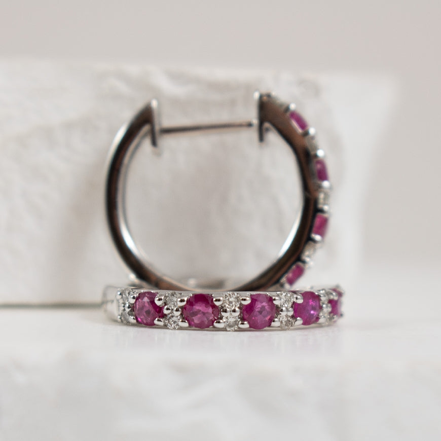 10KW Ruby & Diamond Huggie Hoop Earrings
10K White Gold Ruby & Diamond Huggie Hoop Earrings
0.15 Total Natural Diamond Weight
Earring Closure Huggie Hoop