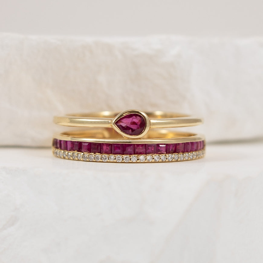 14KY Pear Shaped Ruby & Diamond Double Ring
14K Yellow Gold Bassali Pear Shaped Ruby & Natural Diamond Ring
0.78 Total Ruby Weight
0.07 Total Natural Diamond Weight
Finger Size 6.5