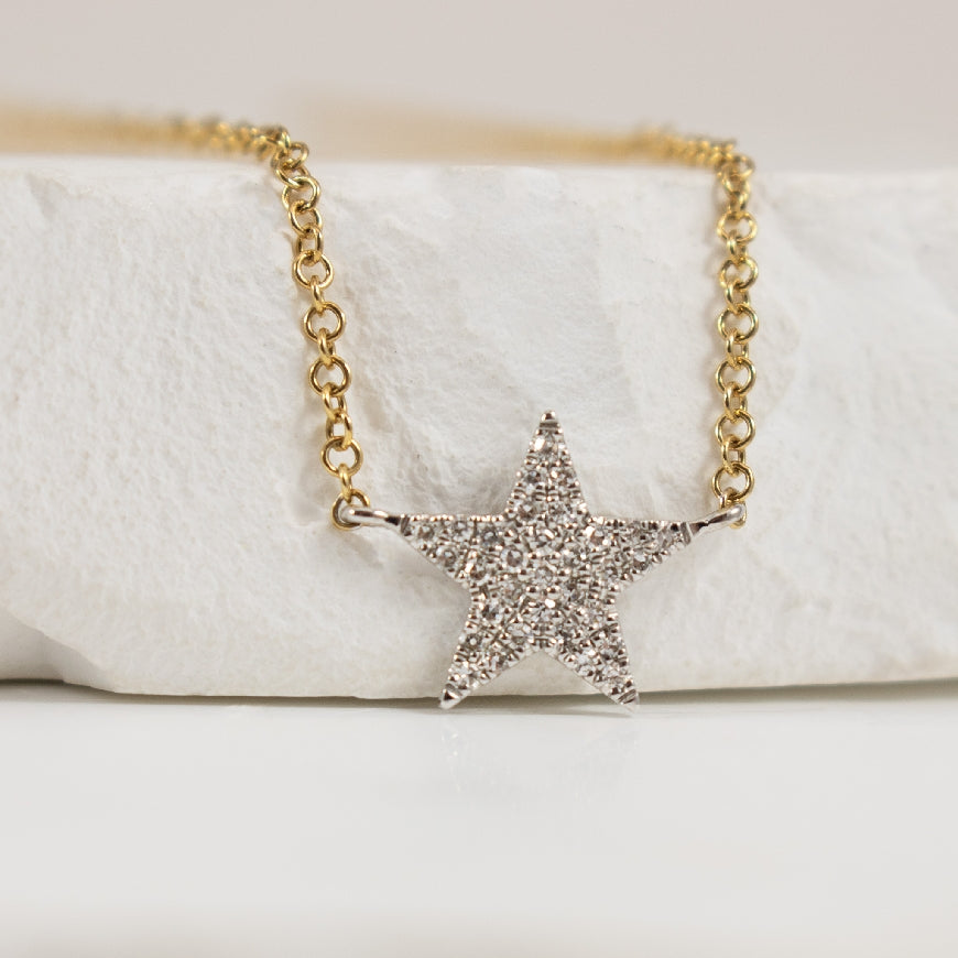 14KYW Bassali Diamond Star Necklace
14K Yellow & White Gold Bassali Natural Diamond Star Necklace
0.07 Total Natural Diamond Weight
Chain Length 18'