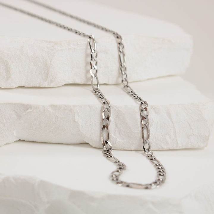 10KW 4.33GR Figaro Chain                          
10K White Gold Figaro Chain
4.33 Grams
Chain Length 18'