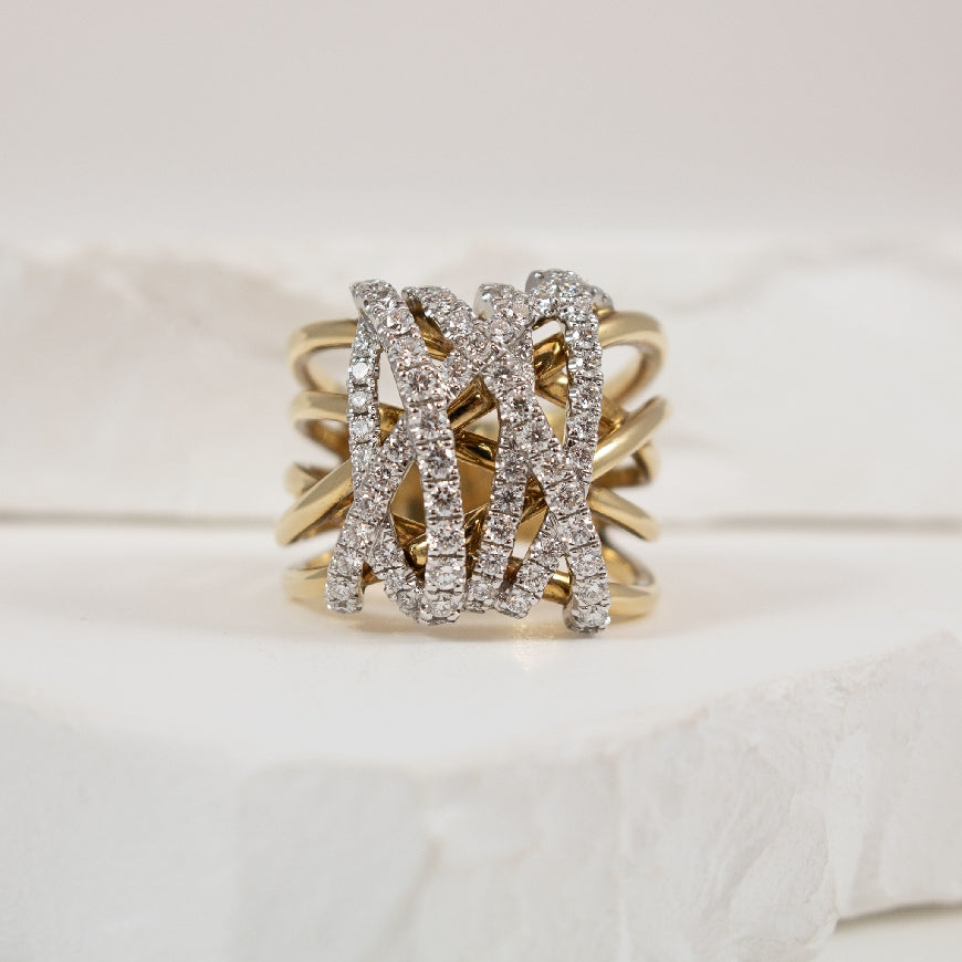 14KY Wrapped Crossover Diamond Ring                    
14K Yellow Gold S.Kashi Natural Diamond Wrapped Ring
0.81 Total Natural Round Brilliant Cut Diamond Weight SI2 Clarity, G Colour 
Finger Size 6