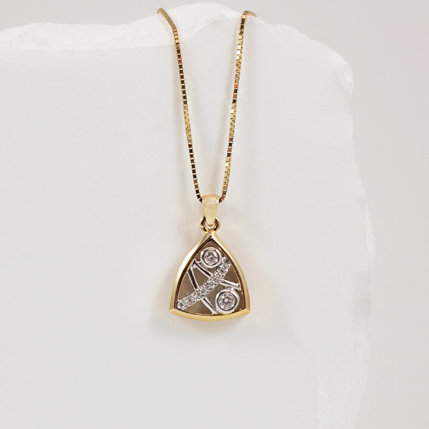 14K Two Tone Geometric Diamond Necklace
14K Yellow & White Gold Natural Diamond Necklace
0.09 Total Natural Diamond Weight SI2 Clarity, HI Colour
Chain Length 18'