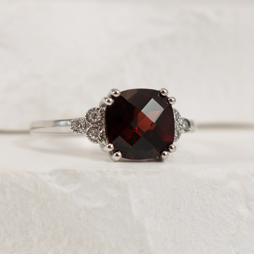 10KW Cushion Cut Garnet & Diamond Ring
10K White Gold Cushion Cut Garnet & Diamond Ring
Finger Size 7