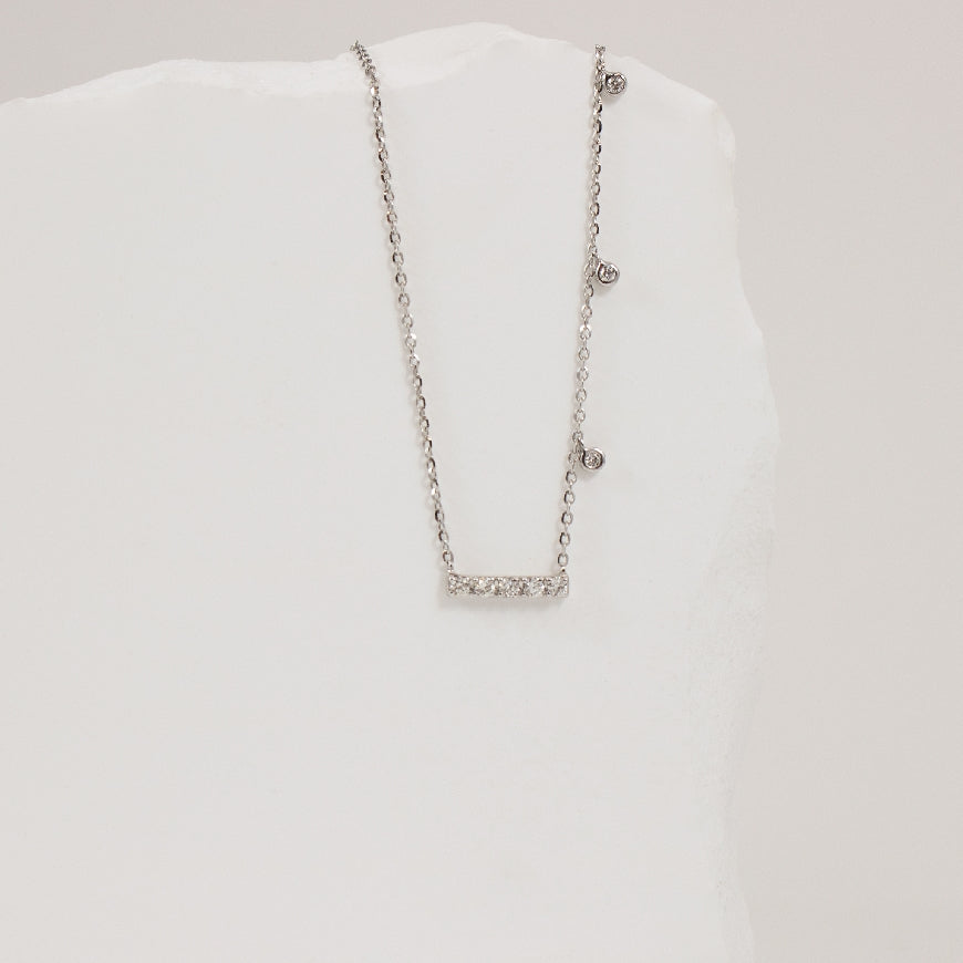 14KW Diamond Bar, Round Station Necklace
14K White Gold Natural Diamond Bar Necklace
0.12 Total Natural Diamond Weight
Chain Length 18' (Adjustable to 16' OR 17')