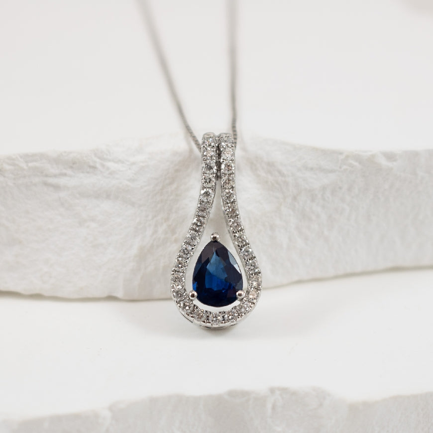 14KW Pear Shaped Sapphire & Diamond Necklace
14K White Gold Pear Shaped Sapphire & Diamond Necklace
0.84 Carat of Pear Shaped Sapphire
0.25 Total Natural Diamond Weight
Chain Length 18'