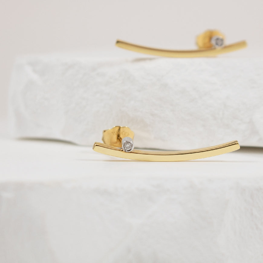 14KY Diamond Accented Curved Bar Earrings
14K Yellow Gold Natural Diamond Earrings
Earring Closure Post with Butterfly Back
1.85 Gram Weight