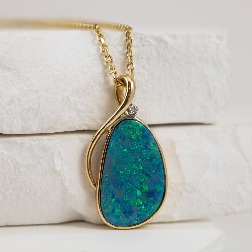 14KY Opal & Diamond Accented Necklace
14K Yellow Gold Opal & Diamond Accented Necklace
4.00 Carat of Opal
0.01 Total Natural Diamond Weight
Chain Length 18'