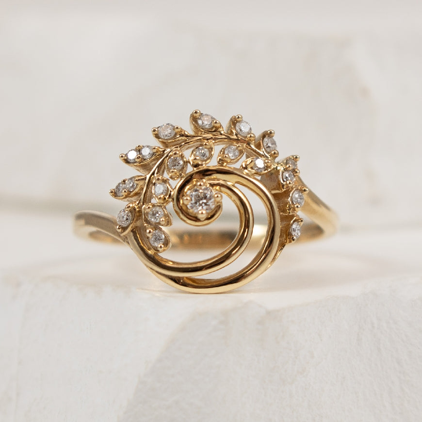 10KY Nature Inspired Canadian Diamond Ring
10K Yellow Gold Nature Inspired Canadian Diamond Ring
0.025 Carat of Natural Diamond of I1 Clarity, G-I Colour
0.075 Total Natural Diamond Weight
Finger Size