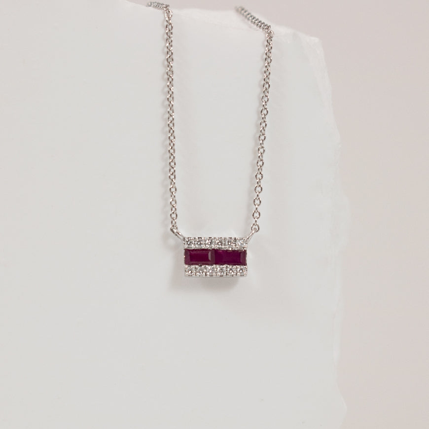 14KW Bassali Mini Bar Ruby & Diamond Necklace
14K White Gold Bassali Ruby & Natural Diamond Bar Necklace
0.17 Total Ruby Weight
0.05 Total Natural Diamond Weight
Chain Length 18' (Adjustable to 17')