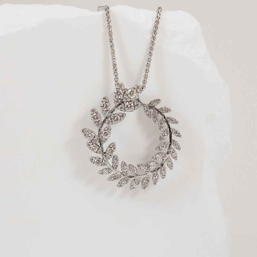 10KW 1.00CT Diamond Wreath Necklace
10K White Gold Diamond Necklace
1.00 Total Natural Diamond Weight I1 Clarity, JK Colour
Chain Length 18'