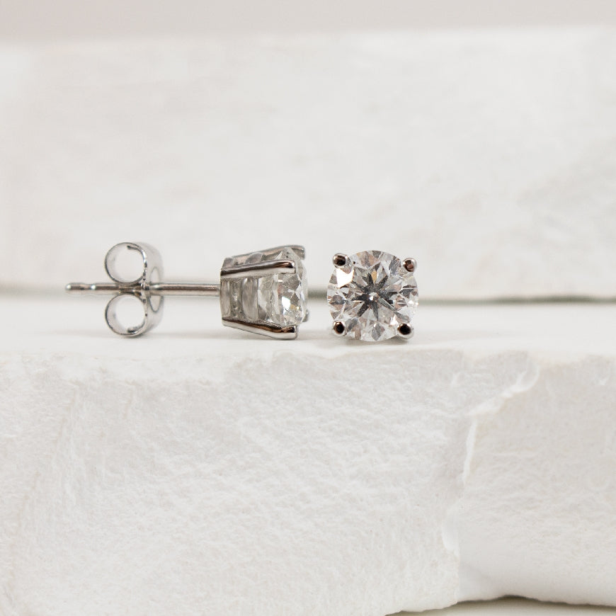 14KW 1.01CT Round Diamond Solitaire Earrings
14K White Gold Natural Canadian Diamond Solitaire Earrings
1.01 Total Natural Round Brilliant Cut Canadian Diamond Weight I1-2 Clarity, F Colour, VG/VG Cut
Earring Closure Post with Butte
