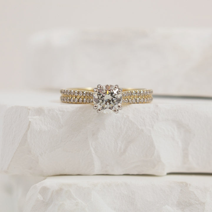 14KY Roman & Jules Diamond Engagement Ring     
14K Yellow Gold Roman & Jules Canadian Natural Diamond Accented Engagement Ring 
Center - 0.74 Carat Round Brilliant Cut Canadian Natural Diamond of SI2 Clarity, I Colour, Very Good Cut 
Accent