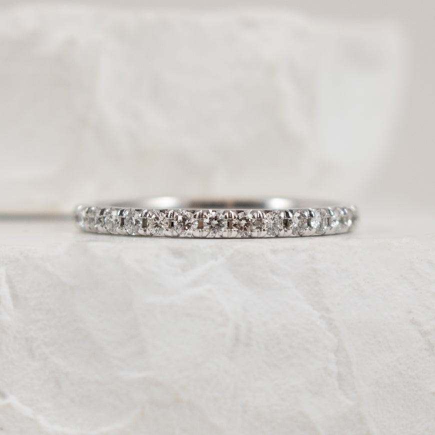 14KW 0.25CT Straight Diamond Band                 
14K White Gold Natural Diamond Band
0.25 Total Natural Diamond Weight of I1 Clarity, GHI Colour 
Finger Size 6.5