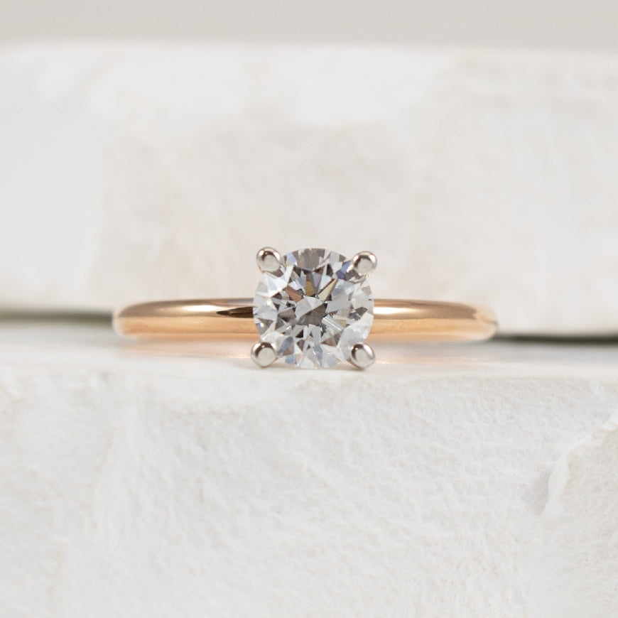 14KR 0.73CT Round Diamond Engagement Ring        
14K Rose & White Gold Lab Grown Diamond Solitaire Engagement Ring 
Center - 0.73 Carat Round Brilliant Cut Lab Grown Diamond of  
VS2 Clarity, H Colour, Excellent/ Excellent/ Excellent Cut