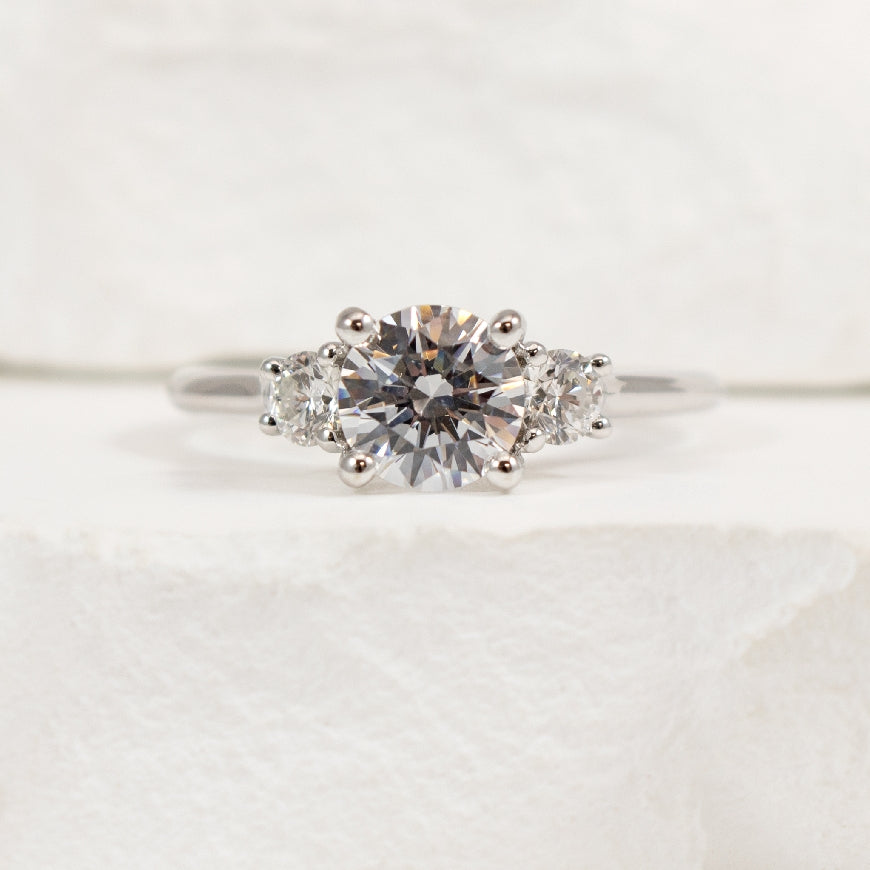 14KW Three Stone Diamond Engagement Ring
14K White Gold Gabriel & Co. Lab Grown & Natural Diamond Engagement Ring
Center - 1.04 Carat Round Brilliant Cut Lab Grown Diamond of VVS2 Clarity, E Colour, Excellent/ Excellent/ Excellent Cu