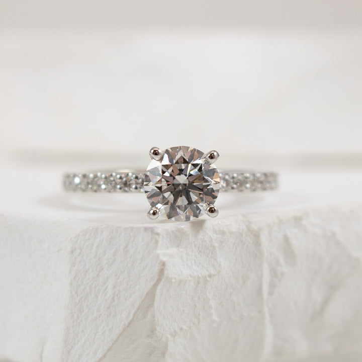 14KW Gabriel & Co. Diamond Engagement Ring        
14K White Gold Gabriel & Co. Lab Grown & Natural Diamond Accented Engagement Ring 
Center - 1.13 Carat Round Brilliant Cut Lab Grown Diamond of VS2 Clarity, E Colour, Ideal/ Excellent/ Excellen