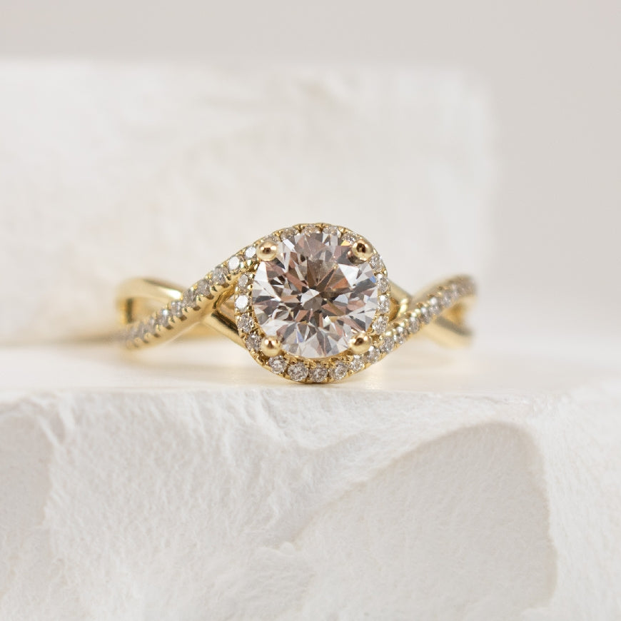 14KY Gabriel & Co. Diamond Accented Ring             
14K Yellow Gold Gabriel & Co. Lab Grown & Natural Diamond Accented Ring  
Center - 1.03 Carat Round Brilliant Cut Lab Grown Diamond of VVS2 Clarity, E Colour, Ideal/ Excellent/ Excellent Cut