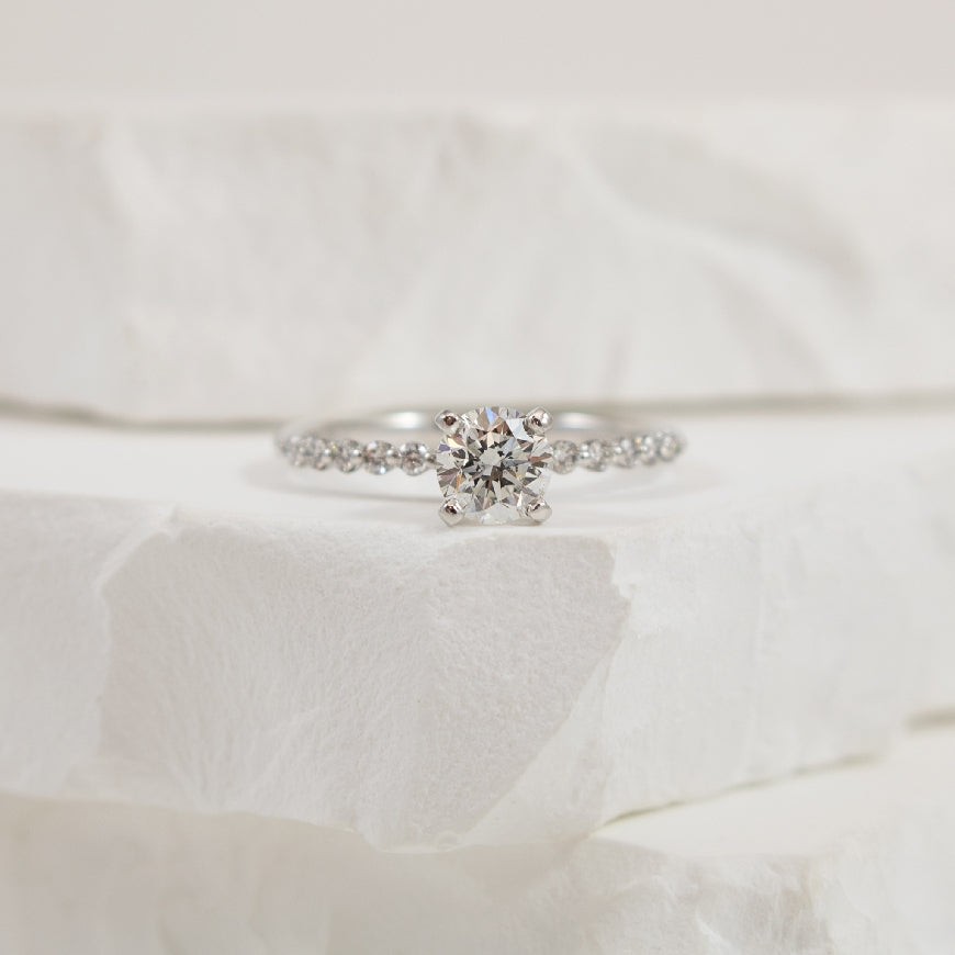 Platinum 0.60CT Floating Diamond Engagement Ring  
Platinum S.Kashi Natural Diamond Accented Engagement Ring 
Center - 0.60 Carat Round Brilliant Cut Natural Diamond of SI2 Clarity, F Colour, Very Good Cut 
 
Accent - 0.16 Carats Round Brilli