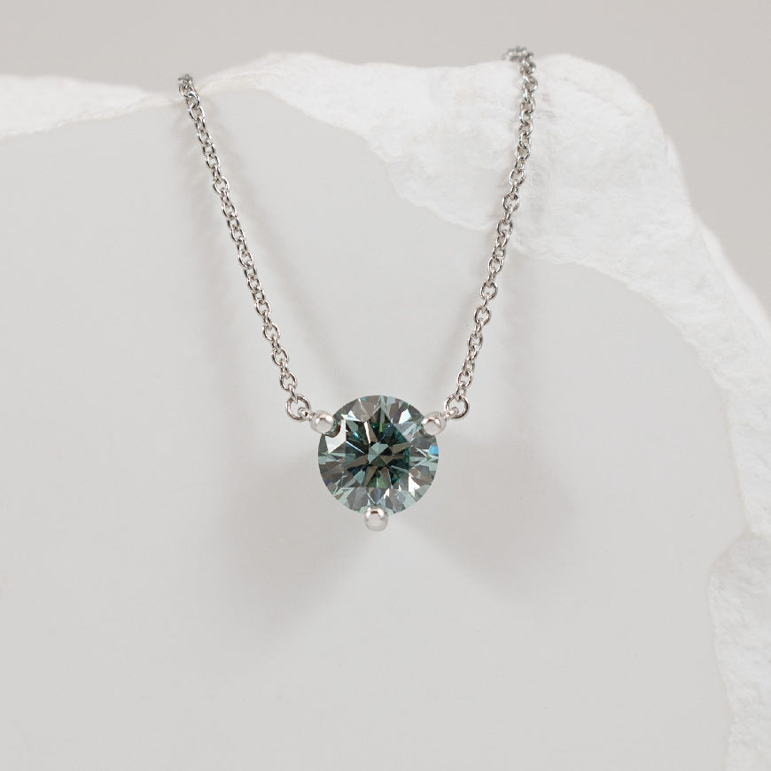 14KW 1.00CT Blue Diamond Solitaire Necklace
14K White Gold Lab Grown Blue Diamond Solitaire Necklace
1.00 Total Lab Grown Diamond Weight VS+ Clarity, VG Cut
Chain Length 16' (Adjustable to 18')