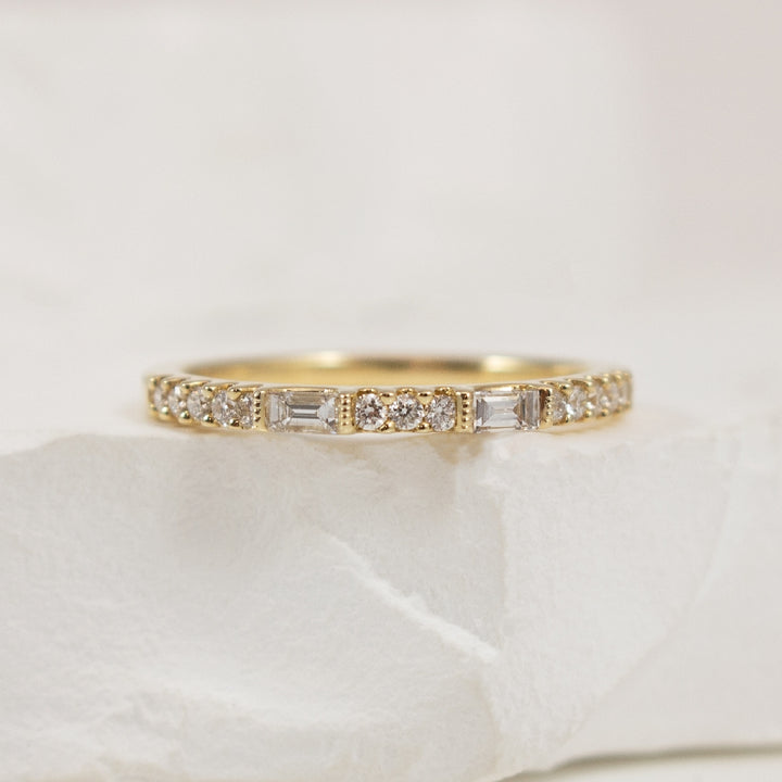 14KY Baguette & Round 0.25CT Diamond Band         
14K Yellow Gold Natural Baguette & Round Diamond Band
0.25 Total Natural Diamond Weight 
Finger Size 6.5