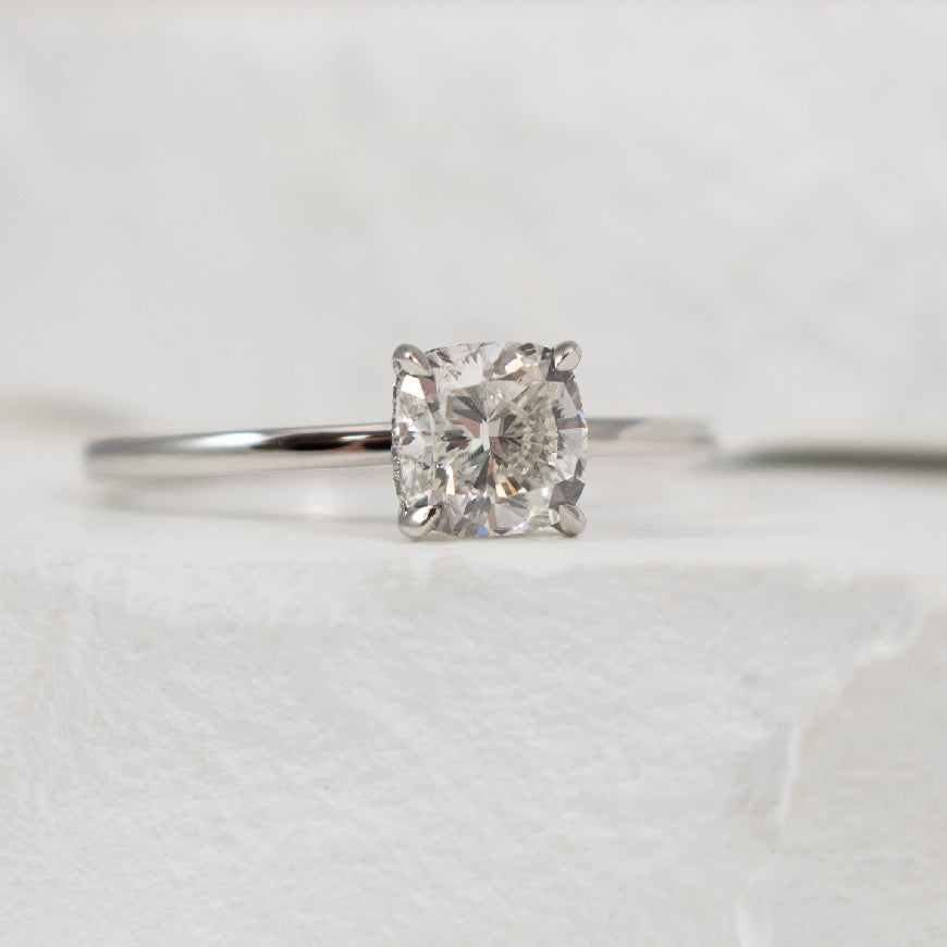 Platinum Forevermark Diamond Engagement Ring     
Platinum Forevermark Solitaire w. Hidden Halo Natural Diamond Engagement Ring     
Center - 1.00CT Cushion Cut Natural Diamond of SI1 Clarity, H Colour, Excellent/ Very Good Cut, Forevermark Cer