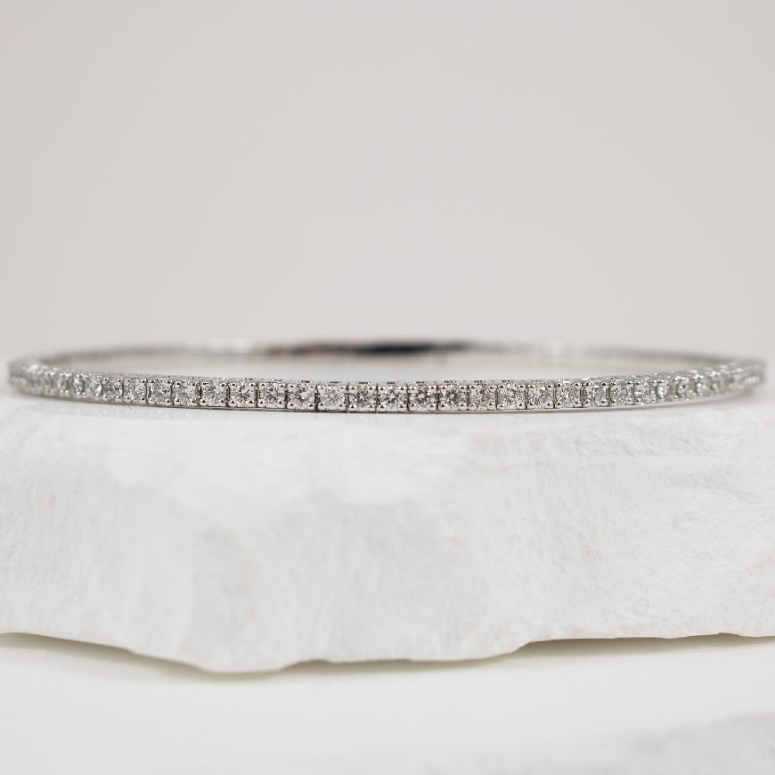14KW 1.00CT Diamond Flexible Bangle
14K White Gold Roman & Jules Natural Diamond Flexible Bangle
1.00 Total Natural Diamond Weight SI1-2 Clarity, G Colour