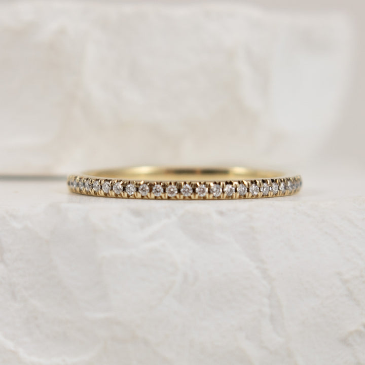 10KY 0.10CT Straight Diamond Band                 
10K Yellow Gold Natural Diamond Band 
0.10 Total Natural Diamond Weight I1 Clarity, HI Colour
Finger Size 6.5