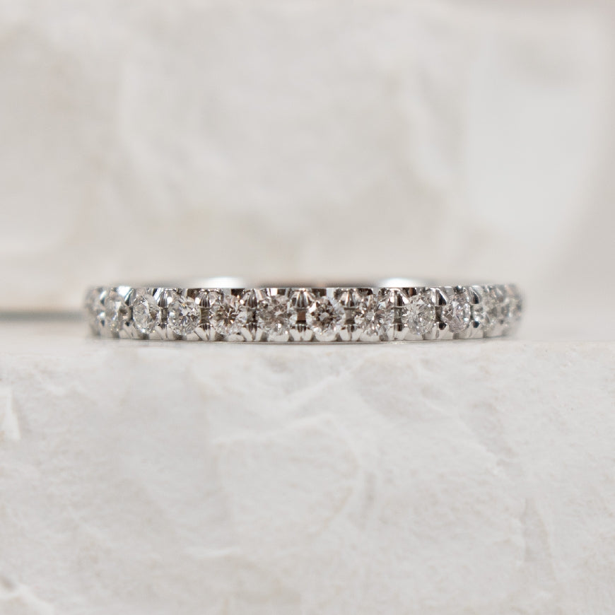 14KW 0.33CT Straight Diamond Band                 
10K White Gold Natural Diamond Band 
0.33 Total Natural Diamond Weight I1-2 Clarity, HIJ Colour
Finger Size 6.5
