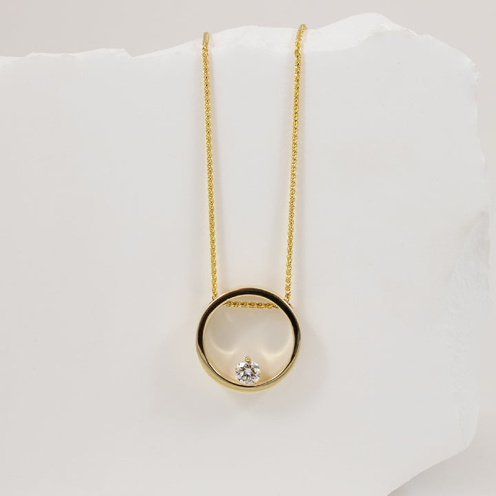 14KY Floating Canadian Diamond Modern Necklace      
14K Yellow Gold Natural Canadian Diamond Necklace
0.44 Carat of Natural Round Brilliant Cut Diamond VS1 Clarity, J Colour, VG Cut
Chain Length 18' (Adjustable to 16' or 17')