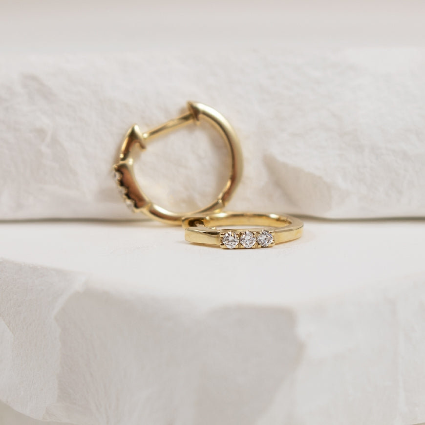 14KY Petite Three Diamond Huggie Hoop Earrings
14K Yellow Gold Basasli Natural Diamond Huggie Hoop Earrings
0.08 Total Natural Diamond Weight
Earring Closure Huggie Hoop