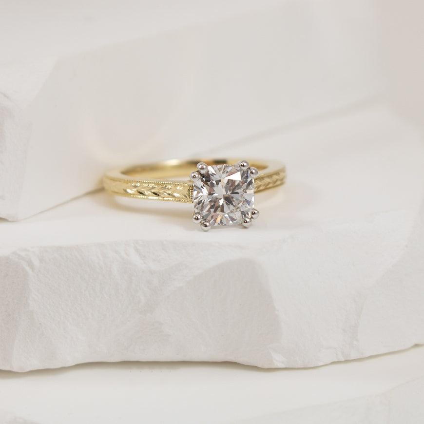 14KY Vintage Style Cushion Diamond Engagement Ring
14K Yellow Gold Gabriel & Co. Lab Grown Diamond Vintage Style Solitaire Engagement Ring 
Center - 1.42CT Cushion Cut Lab Grown Diamond of VVS2 Clarity, D Colour, Excellent/ Excellent Cut 
Ba