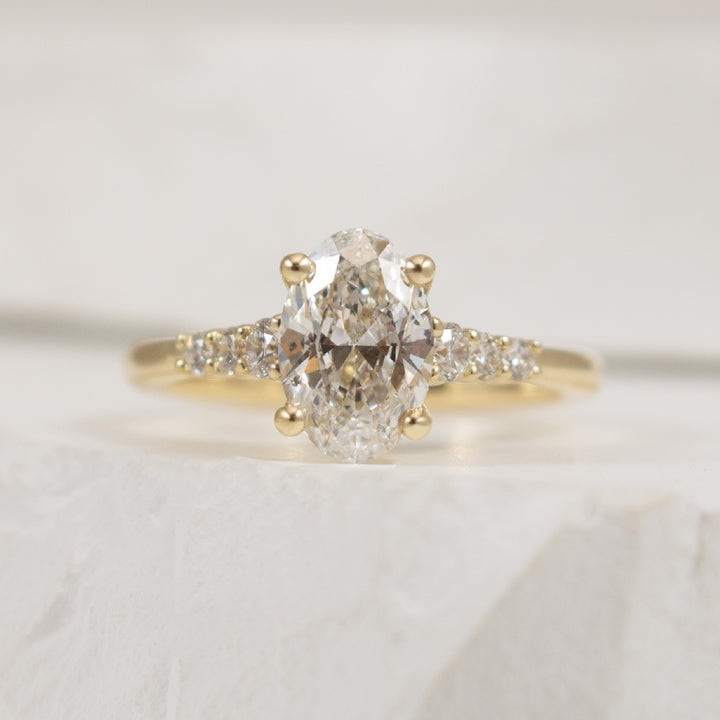 14KY Gabriel & Co. 1.20CT Diamond Engagement Ring 
14K Yellow Gold Gabriel & Co. Oval Cut Natural Diamond Engagement Ring 
Center - 1.20CT Oval Cut Natural Diamond of SI2 Clarity, F Colour, Very Good Cut, GIA Certified 
Accent - 0.21 Total N