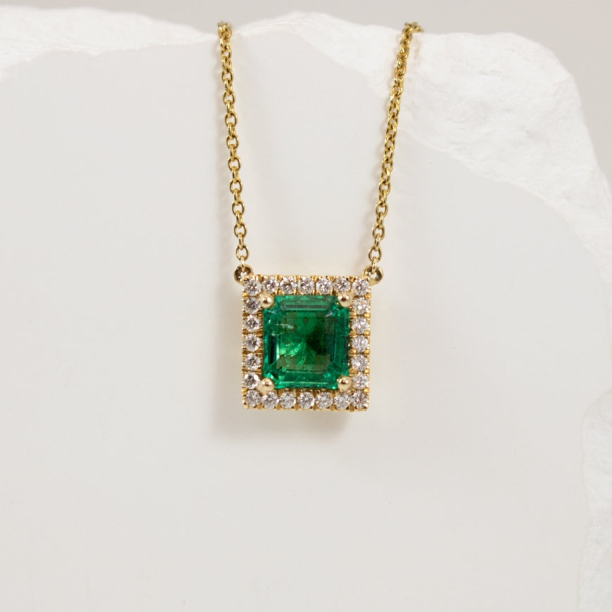 14KY Princess Cut Emerald & Diamond Halo Necklace
14K Yellow Gold Roman & Jules Emerald & Natural Diamond Halo Necklace
1.30 Carat Princess Cut Emerald
0.20 Total Natural Diamond Weight SI Clarity, GH Colour
Chain Length 18' (Adjustable)