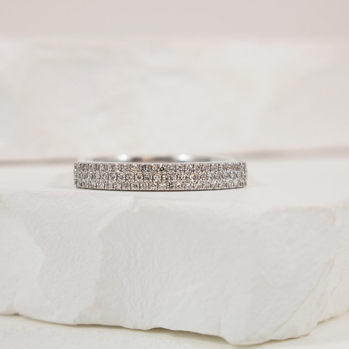 14KW Micro Pave Diamond Stacker Band              
14K White Gold Roman & Jules Natural Diamond Band
0.19 Total Natural Diamond Weight SI Clarity, GH Colour
Finger Size 6.5