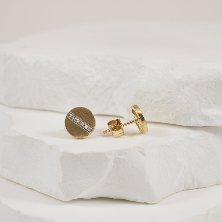 10KY Diamond Accented Brushed Gold Circle Earrings
10K Yellow Gold Natural Diamond Brushed Earrings
0.04 Total Natural Diamond Weight I1-2 Clarity, HIJ Colour
Earring Closure Post with Butterfly B