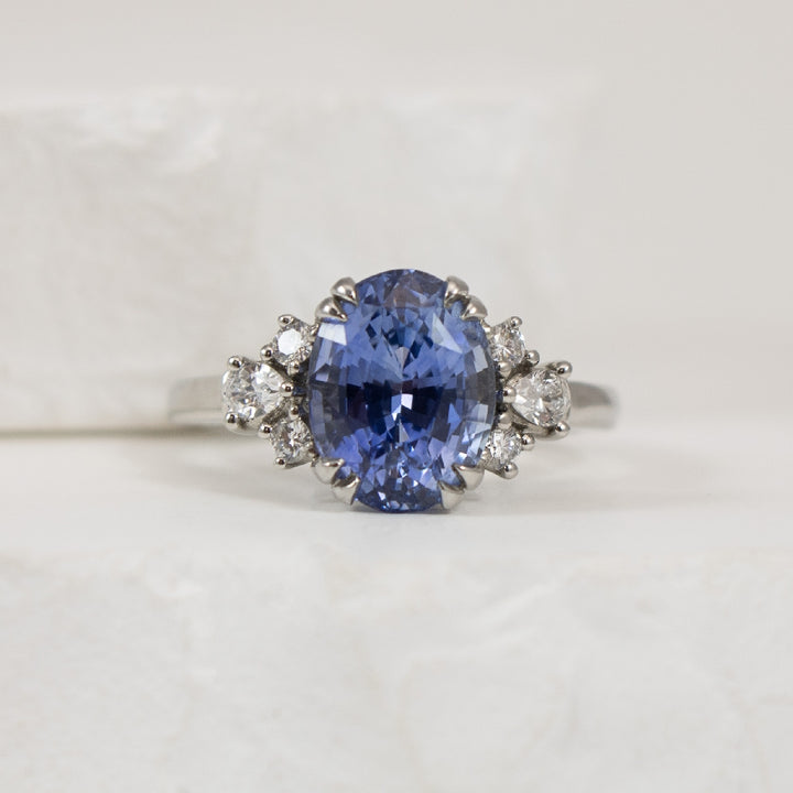 Platinum 4.03CT Oval Cut Cornflower Sapphire Ring 
Platinum Cornflower Sapphire & Natural Diamond Ring
4.03 Carat Oval Cut Cornflower Sapphire
0.15 Total Natural Diamond Weight SI-VS Clarity, FG Colour
Finger Size 6.5