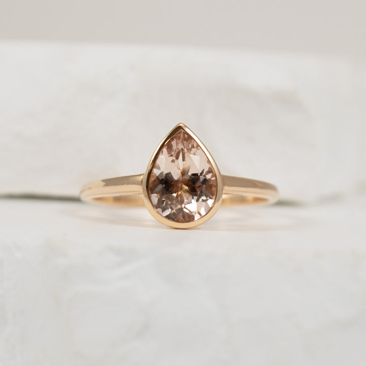 14KR Pear Shaped Bezel Set Morganite Ring    
14K Rose Gold Morganite Pear Shape Bezel Ring
1.07 Carat Pear Shaped Morganite 
Finger Size 7