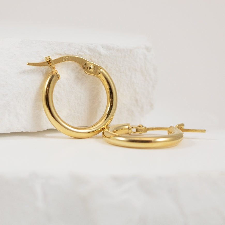10KY Tube Hoop Earrings
10K Yellow Gold Tube Hoop Earrings
Earring Closure Hinged Post
10mm Diameter
0.76 Grams