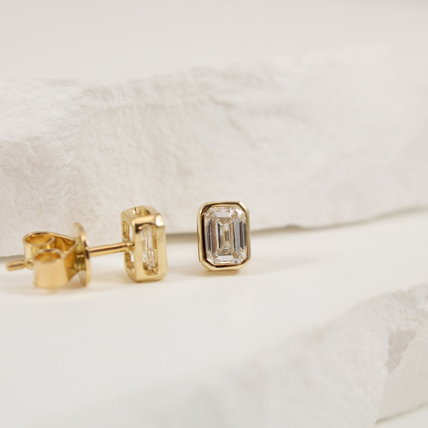 14KY Emerald Cut Diamond Bezel Set Earrings
14K Yellow Gold Lab Grown Diamond Emerald Cut Bezel Earrings
1.00 Total Lab Grown Emerald Cut Diamonds VS2 Clarity, F Colour
Earring Closure Post with Butterfly Back