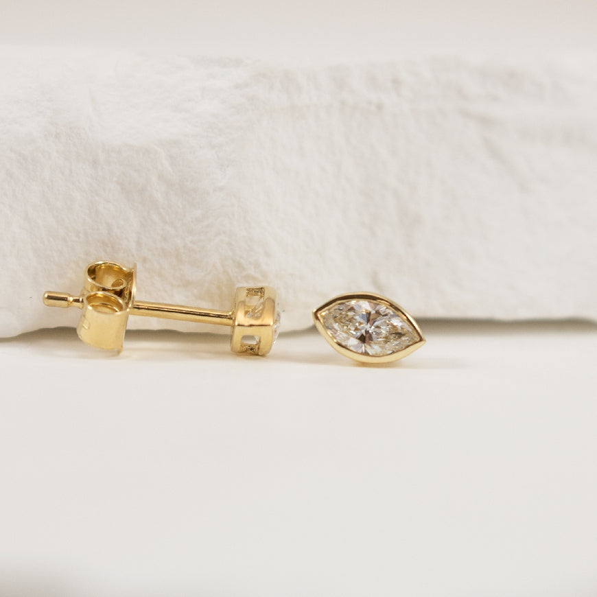 14KY Marquise Cut Diamond Bezel Set Earrings
14K Yellow Gold Lab Grown Diamond Marquise Cut Bezel Earrings
0.50 Total Lab Grown Marquise Diamonds VS2 Clarity, F Colour
Earring Closure Post with Butterfly Back